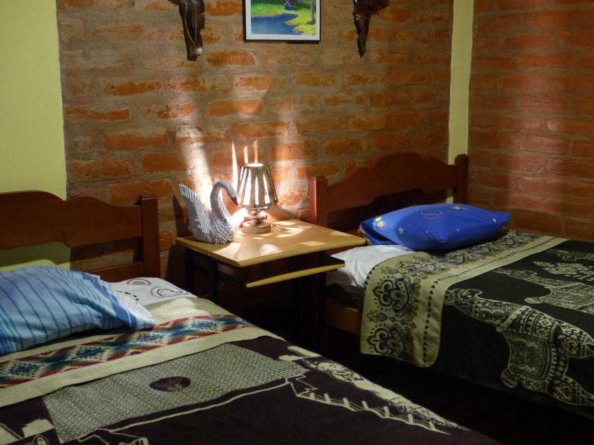 Hostal La Casa Amarilla City Banos  Exterior photo